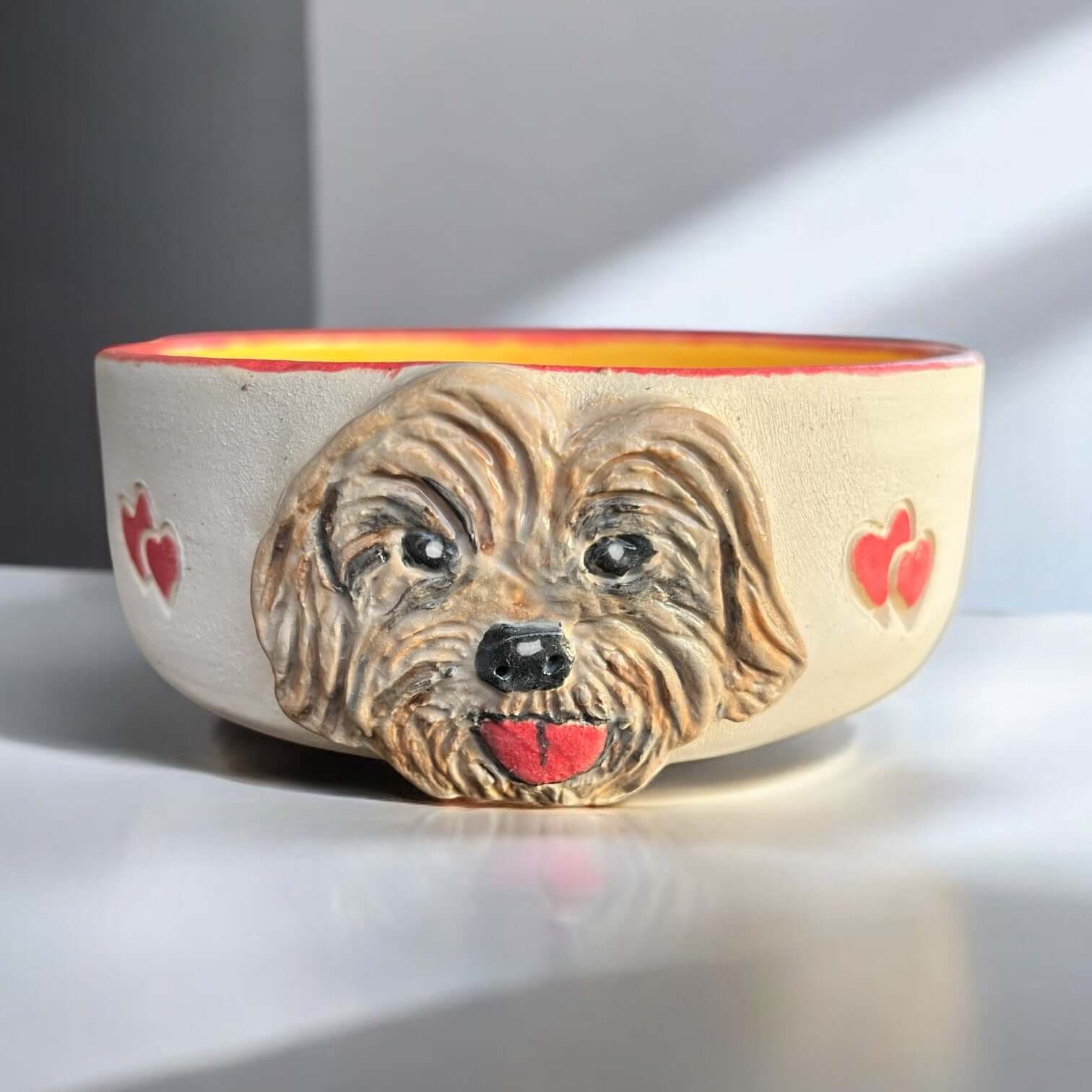 Hand-painted dog bowl featuring a Cockapoo face and red hearts, perfect for food or water, diameter 14.5 cm.
