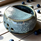 Handmade ceramic berry rinsing mug