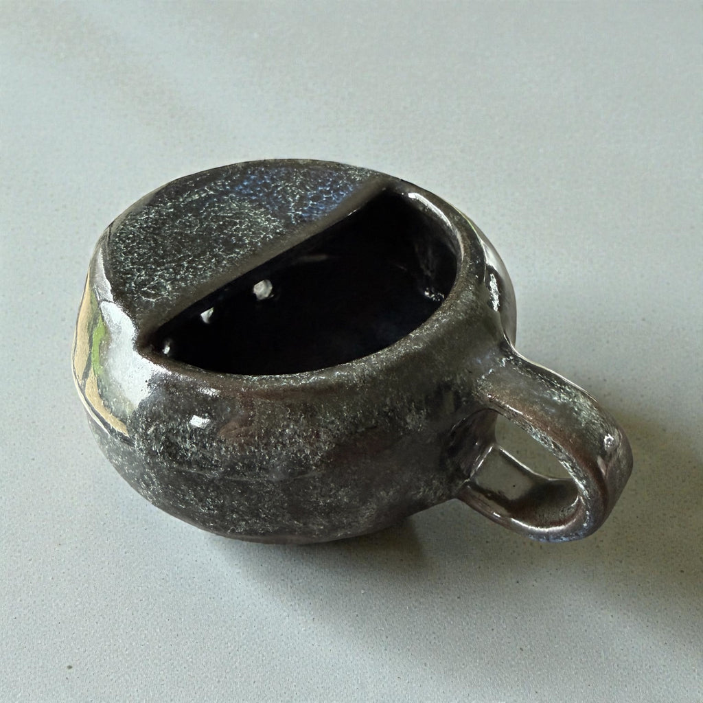 Handmade ceramic berry rinsing mug
