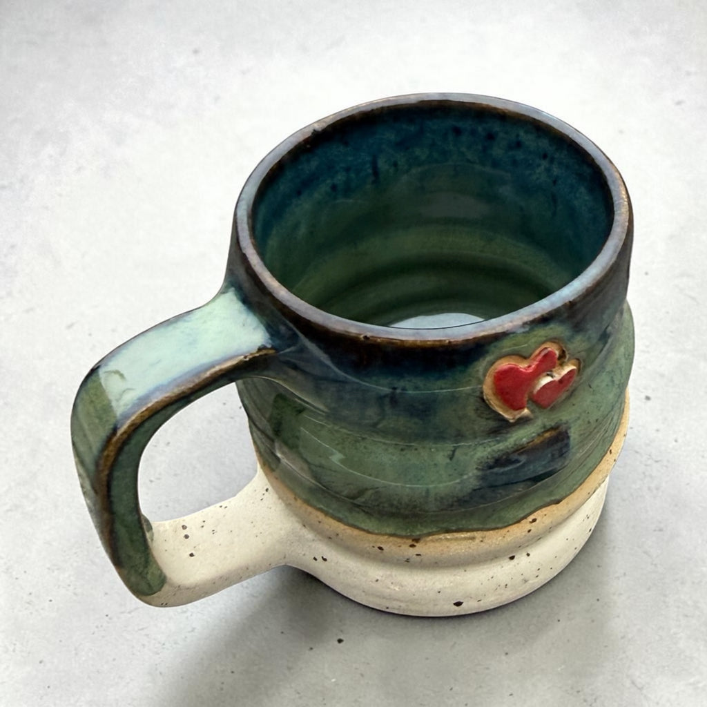 Handmade ceramic mug – green glaze with blue and brown tones